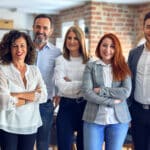 Group of business workers smiling happy and confident. Posing together with smile on face looking at the camera at the office